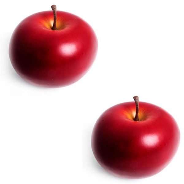 two artificial red apples