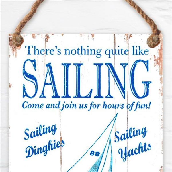 blue and white nautical sign about sailing