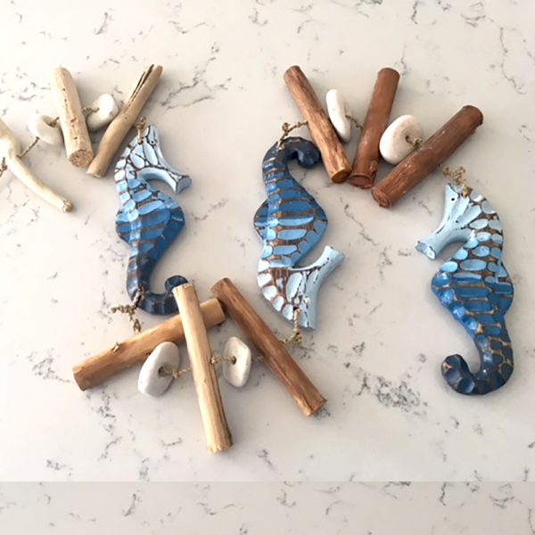 rustic seahorse garland with pebbles and driftwood