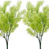 green artificial conifer bushes