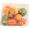 assorted artificial pumpkins with maple leaves