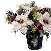 white Christmas poinsettia memorial arrangement with pine cones, fruit and winter foliage
