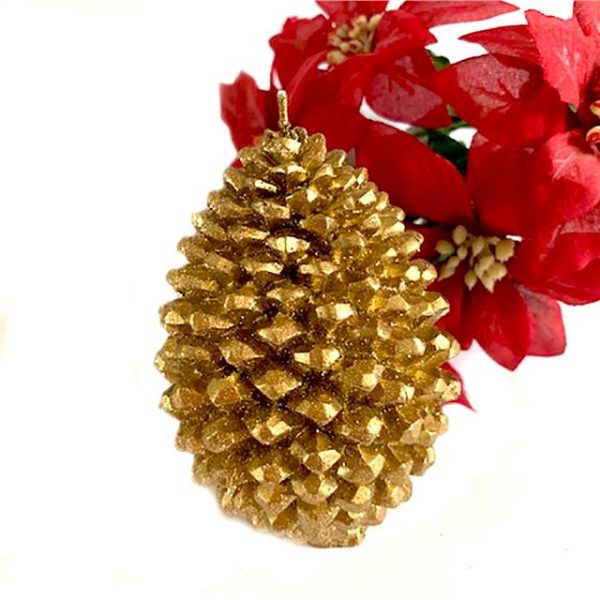 Gold pine cone candle