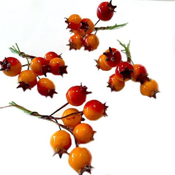 red and orange artificial Christmas berry picks