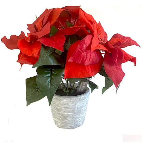 red artificial potted poinsettia in grey pot