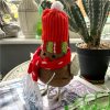 large felt robin decoration with red hat and scarf