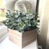 https://shared1.ad-lister.co.uk/UserImages/7eb3717d-facc-4913-a2f0-28552d58320f/Img/artificialpo/Green-Grey-Eucalyptus-In-Wooden-Pot.jpg