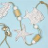 https://shared1.ad-lister.co.uk/UserImages/7eb3717d-facc-4913-a2f0-28552d58320f/Img/artificialga/Wooden-Nautical-garland-Starfish-Fish-and-Seahorse.jpg