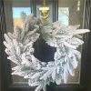https://shared1.ad-lister.co.uk/UserImages/7eb3717d-facc-4913-a2f0-28552d58320f/Img/christmas_new/Snow-covered-spruce-Christmas-Wreath-50cm.jpg