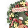 https://shared1.ad-lister.co.uk/UserImages/7eb3717d-facc-4913-a2f0-28552d58320f/Img/christmas_new/Spruce-Christmas-Wreath-with-Gingerbreadman-and-Kisses.jpg
