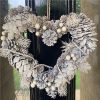 https://shared1.ad-lister.co.uk/UserImages/7eb3717d-facc-4913-a2f0-28552d58320f/Img/christmas_new/White-Heart-Christmas-Wreath-30cm.jpg